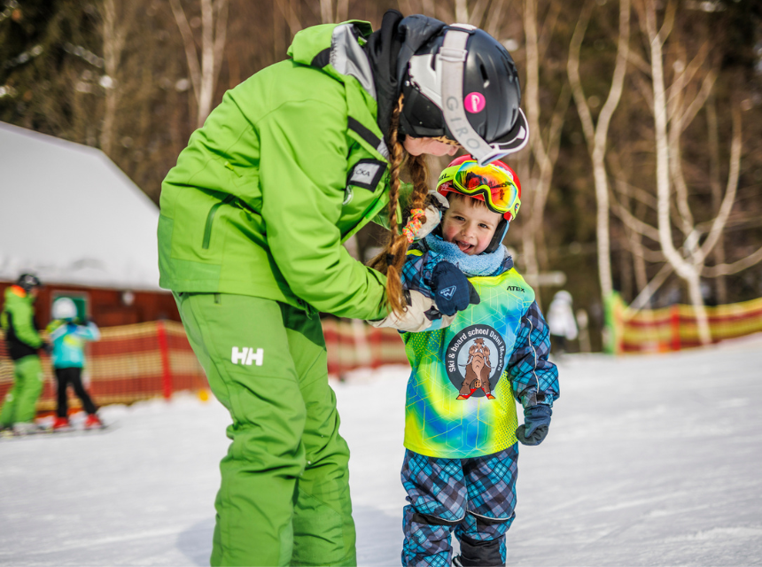 Into the mountains with small mountain skiers