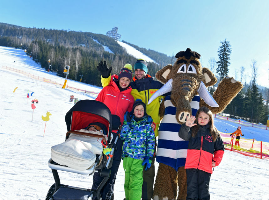 Into the mountains with small mountain skiers